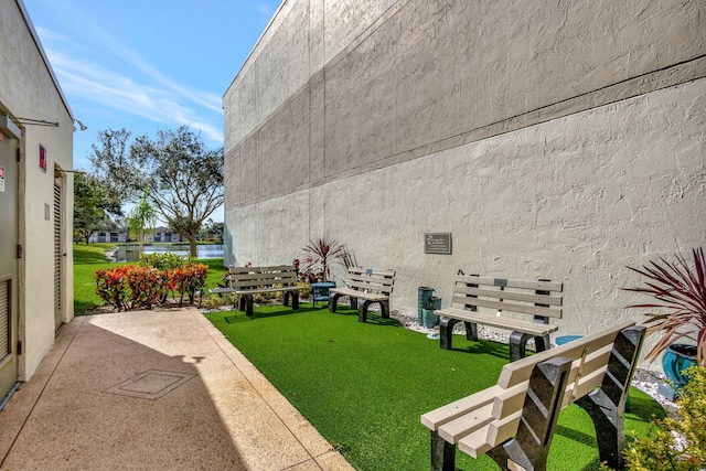 view of yard with a water view