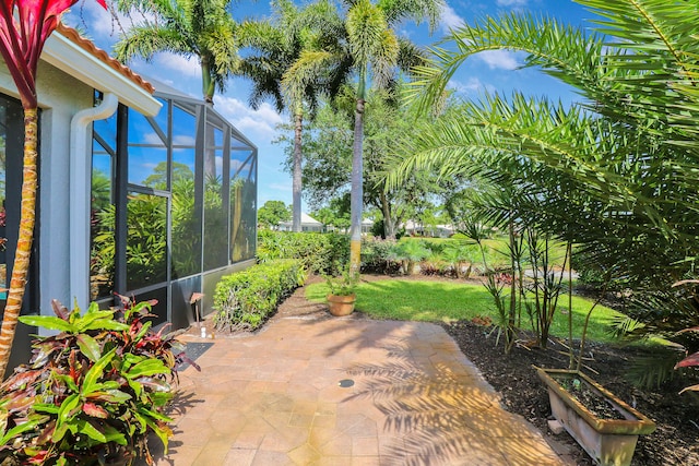 view of patio / terrace with glass enclosure