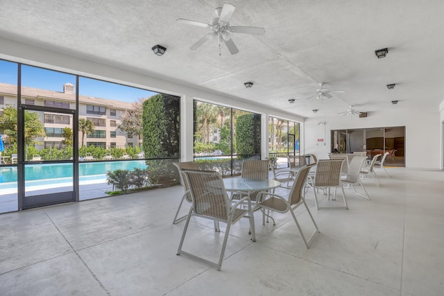 unfurnished dining area with ceiling fan