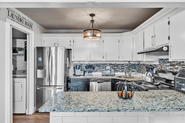 kitchen featuring a textured ceiling, white cabinets, decorative light fixtures, and stainless steel appliances