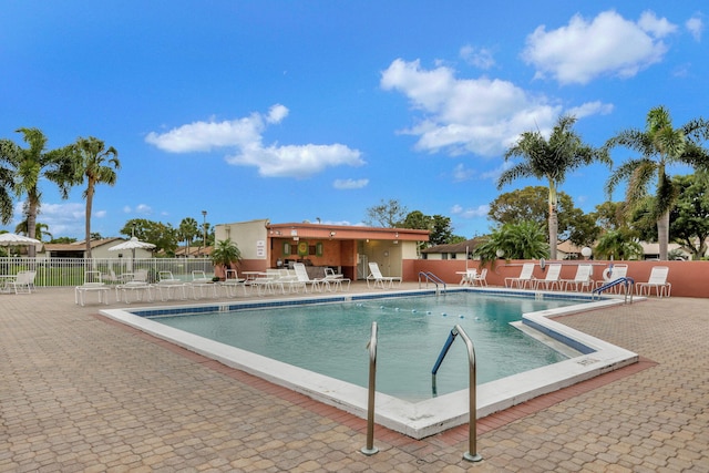 view of swimming pool featuring a patio