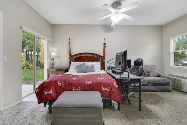 carpeted bedroom featuring access to exterior and ceiling fan