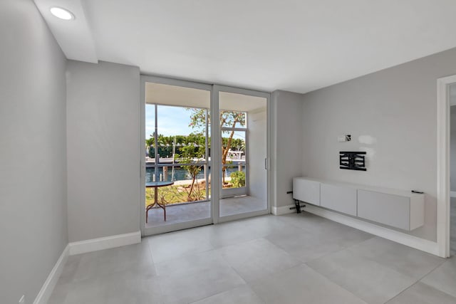 entryway featuring a water view