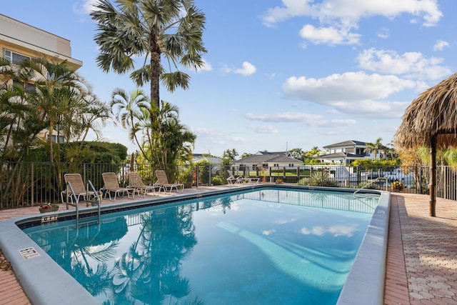 view of swimming pool with a patio area