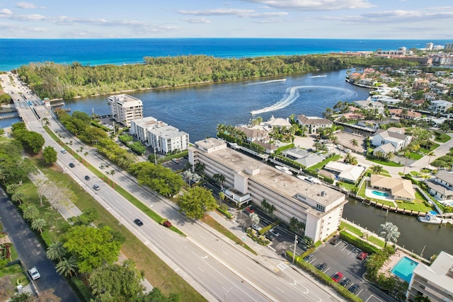 drone / aerial view with a water view