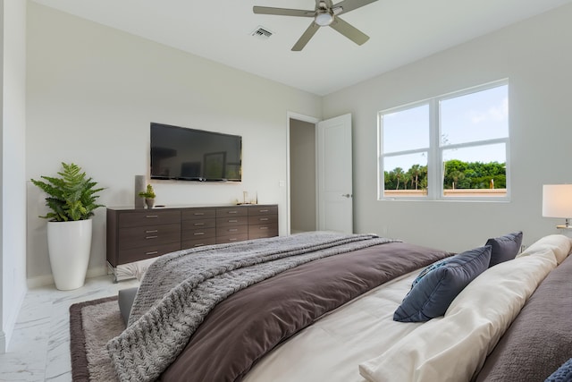 bedroom featuring ceiling fan