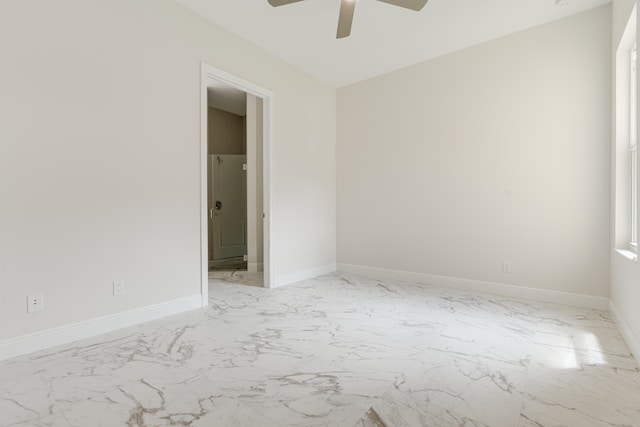 unfurnished room featuring vaulted ceiling and ceiling fan