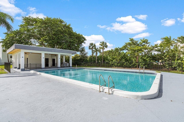 view of swimming pool featuring a patio area