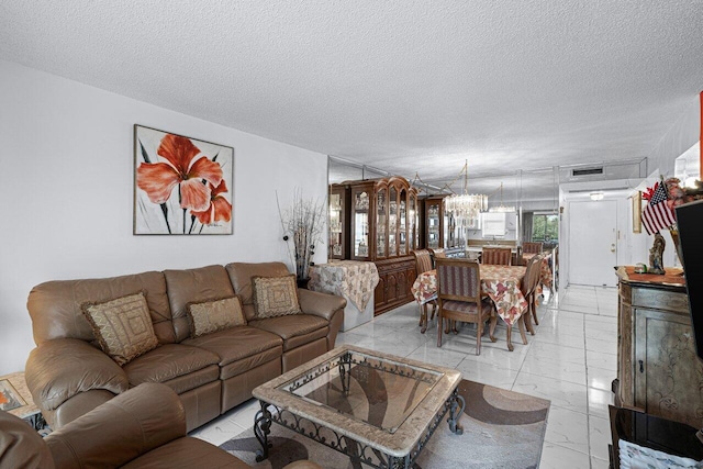 living room with a textured ceiling