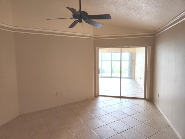 empty room with crown molding, a textured ceiling, light tile patterned flooring, and ceiling fan