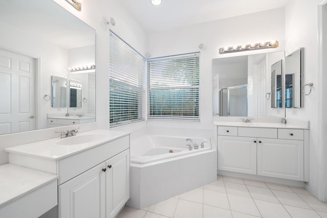 bathroom with vanity, tile patterned floors, and separate shower and tub