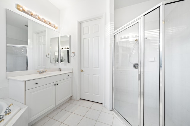 bathroom featuring vanity, tile patterned floors, and independent shower and bath