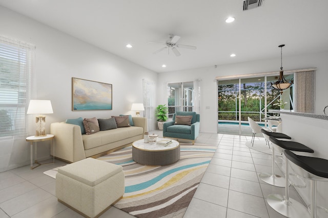 living room featuring light tile patterned floors, a wealth of natural light, and ceiling fan