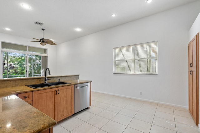 kitchen with ceiling fan, stainless steel dishwasher, sink, and light tile patterned floors