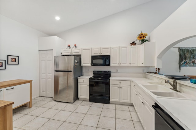 kitchen featuring a sink, black appliances, light countertops, and white cabinets