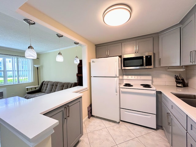 kitchen featuring white appliances, sink, backsplash, gray cabinets, and light tile patterned floors