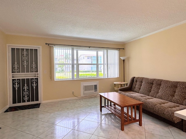 living room with an AC wall unit, crown molding, a textured ceiling, and light tile patterned floors