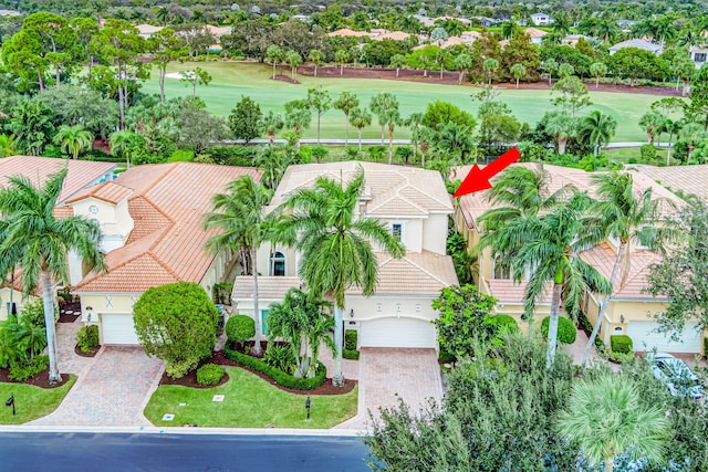 bird's eye view with a residential view and view of golf course