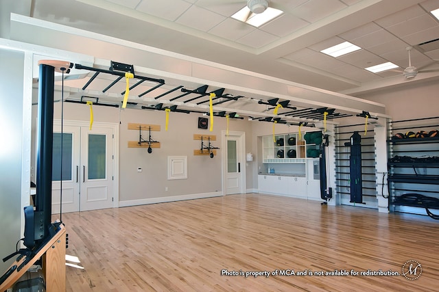 unfurnished living room with hardwood / wood-style floors and ceiling fan