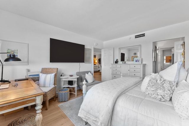 bedroom featuring light hardwood / wood-style floors