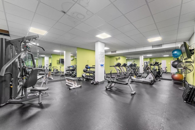 gym with a drop ceiling