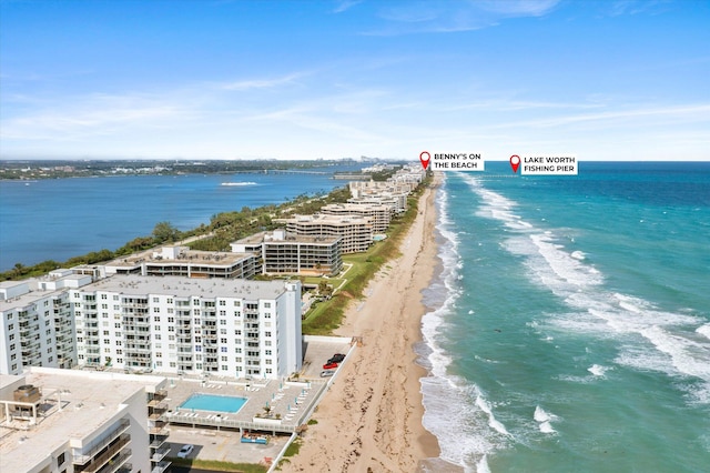 aerial view with a view of the beach and a water view