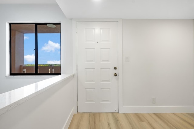 doorway to outside featuring light hardwood / wood-style flooring