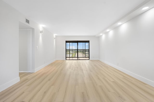 empty room featuring light hardwood / wood-style floors