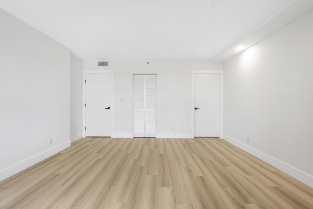 unfurnished bedroom with light hardwood / wood-style flooring