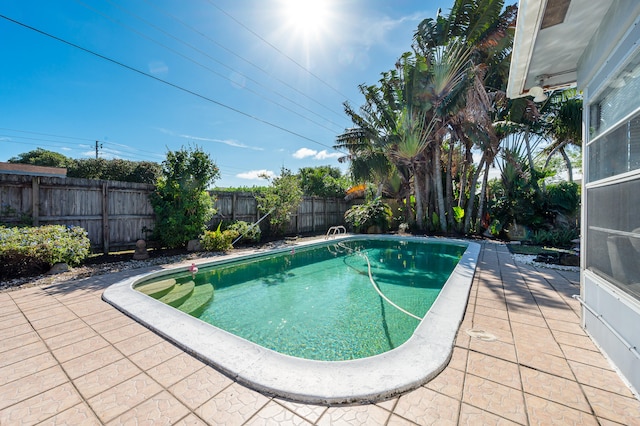 view of pool with a patio area