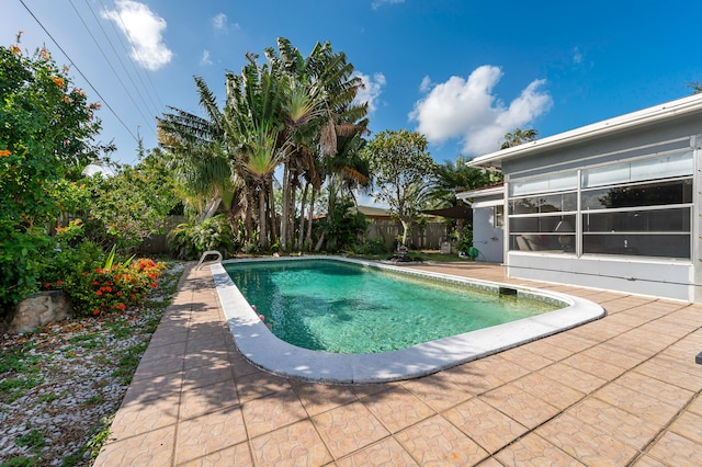 view of pool featuring a patio area