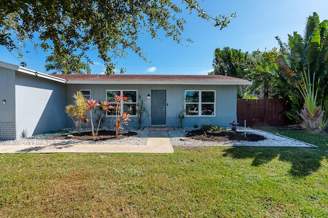 ranch-style house with a front yard