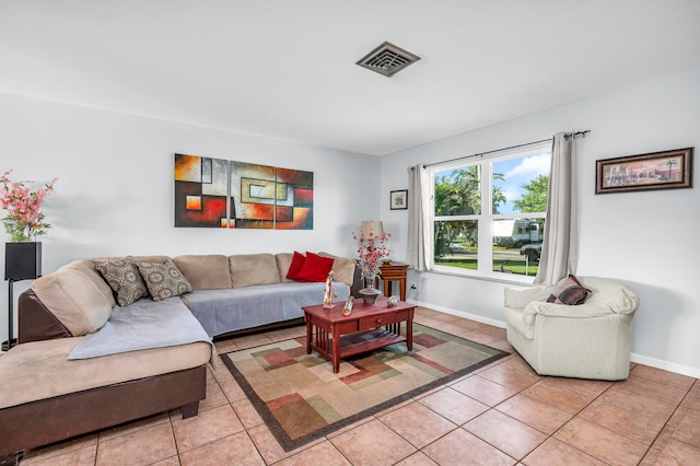 living room featuring light tile patterned flooring