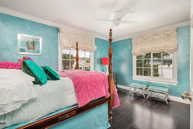 bedroom featuring ceiling fan, dark hardwood / wood-style flooring, and ornamental molding