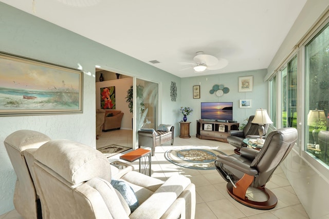 670 Senegal Ct, Fort Pierce, FL 34982 - tiled living room featuring plenty of natural light and ceiling fan