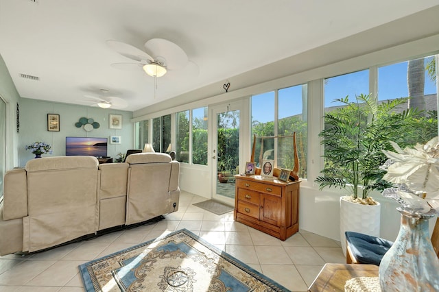 670 Senegal Ct, Fort Pierce, FL 34982 - living room with plenty of natural light, light tile patterned floors, and a ceiling fan