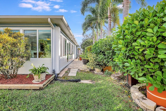 670 Senegal Ct, Fort Pierce, FL 34982 - view of yard featuring a sunroom