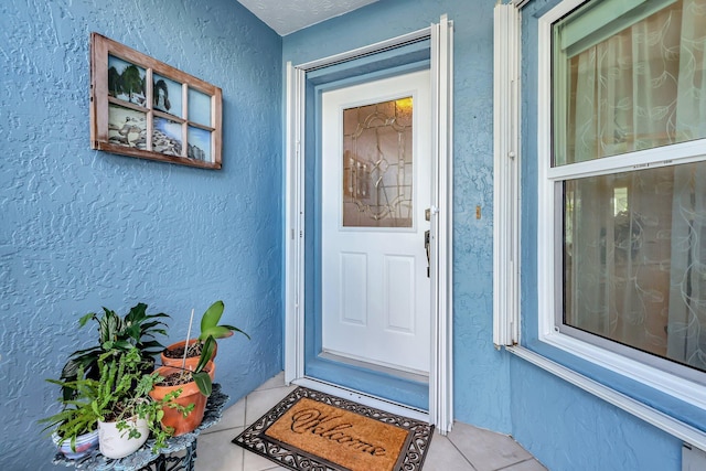 670 Senegal Ct, Fort Pierce, FL 34982 - property entrance with stucco siding