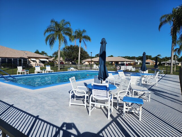 670 Senegal Ct, Fort Pierce, FL 34982 - community pool with fence and a patio area