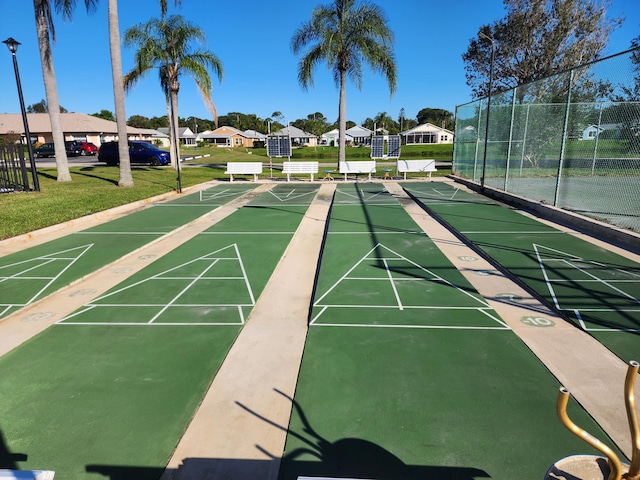 670 Senegal Ct, Fort Pierce, FL 34982 - view of home's community with shuffleboard and a residential view