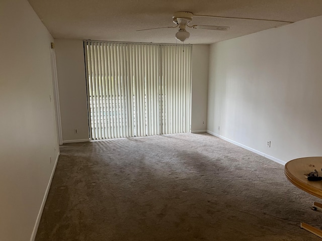 unfurnished room with carpet, a textured ceiling, and ceiling fan