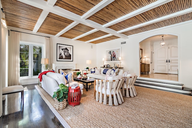 living room with beam ceiling, a fireplace, wood-type flooring, wood ceiling, and coffered ceiling