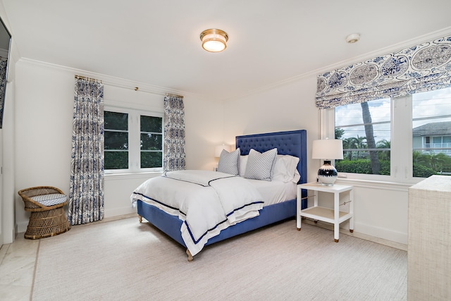 carpeted bedroom with crown molding