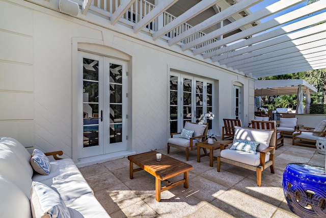 view of patio with french doors, outdoor lounge area, and a pergola