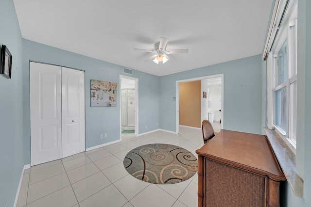 tiled office with ceiling fan