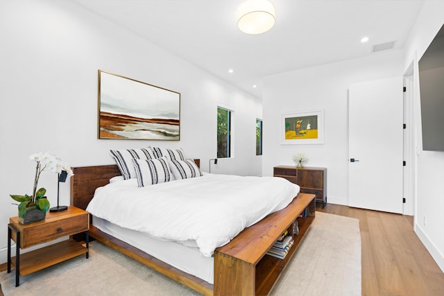 bedroom featuring light hardwood / wood-style flooring