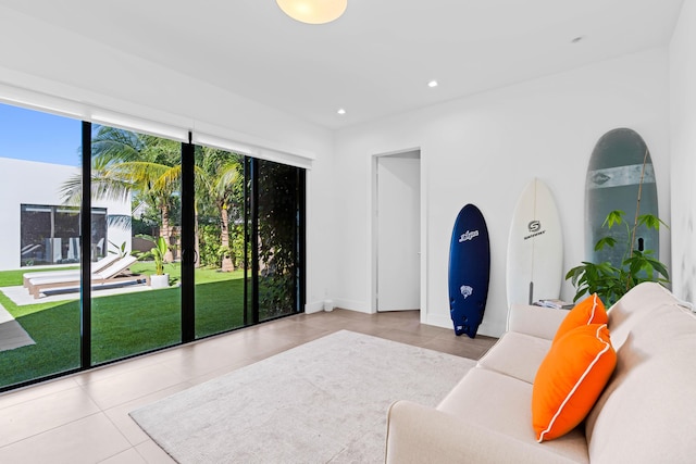 interior space with light tile patterned flooring and a wealth of natural light