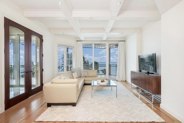 living room with beam ceiling, french doors, light hardwood / wood-style floors, and coffered ceiling