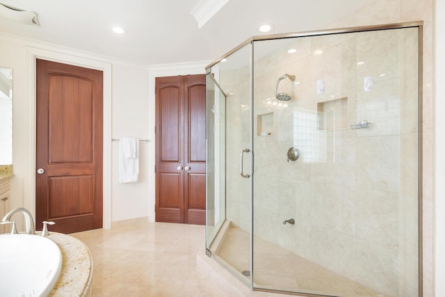 bathroom featuring plus walk in shower, tile patterned floors, and crown molding