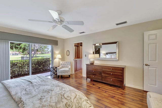 bedroom featuring access to exterior, a walk in closet, ceiling fan, hardwood / wood-style flooring, and a closet